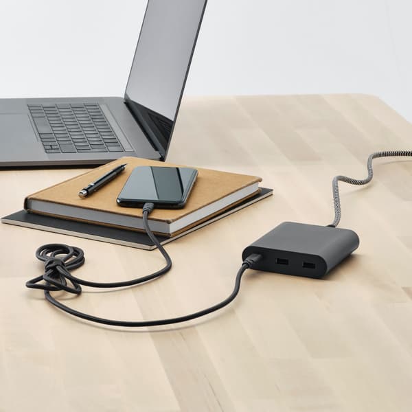 A phone being charged using the LILLHULT USB type C to lightning cord in dark grey