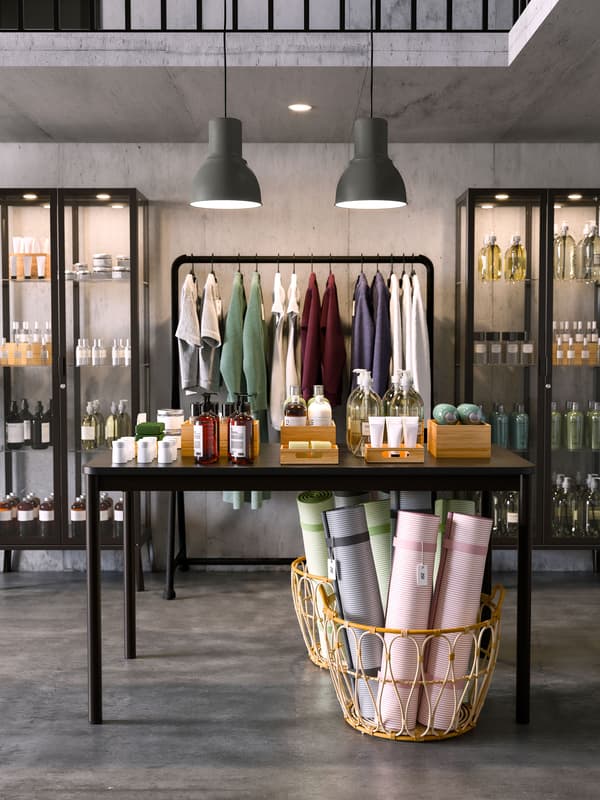 A retail store shop floor featuring a TOMMARYD table with products for sale on top
