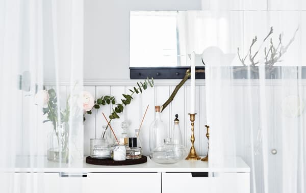 A scent station with candles , flowers and perfumes. What’s your dream bedroom?