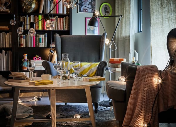 A seating area with string lights scattered around, to give a festive feeling.