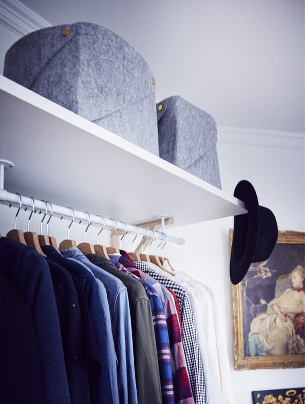 A section of open wardrobe and storage.