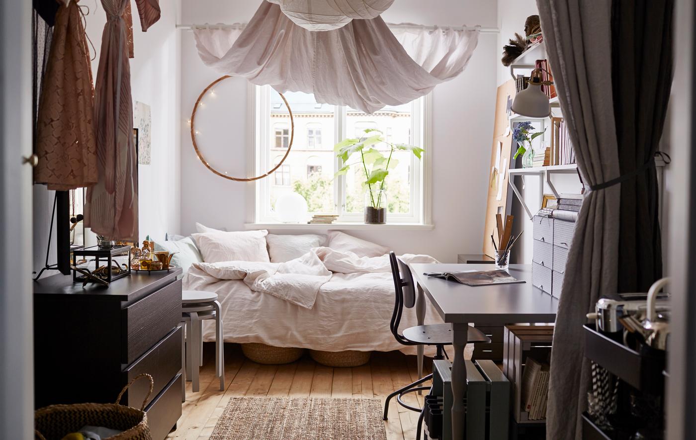A shot of an entire dorm room from the entrance.