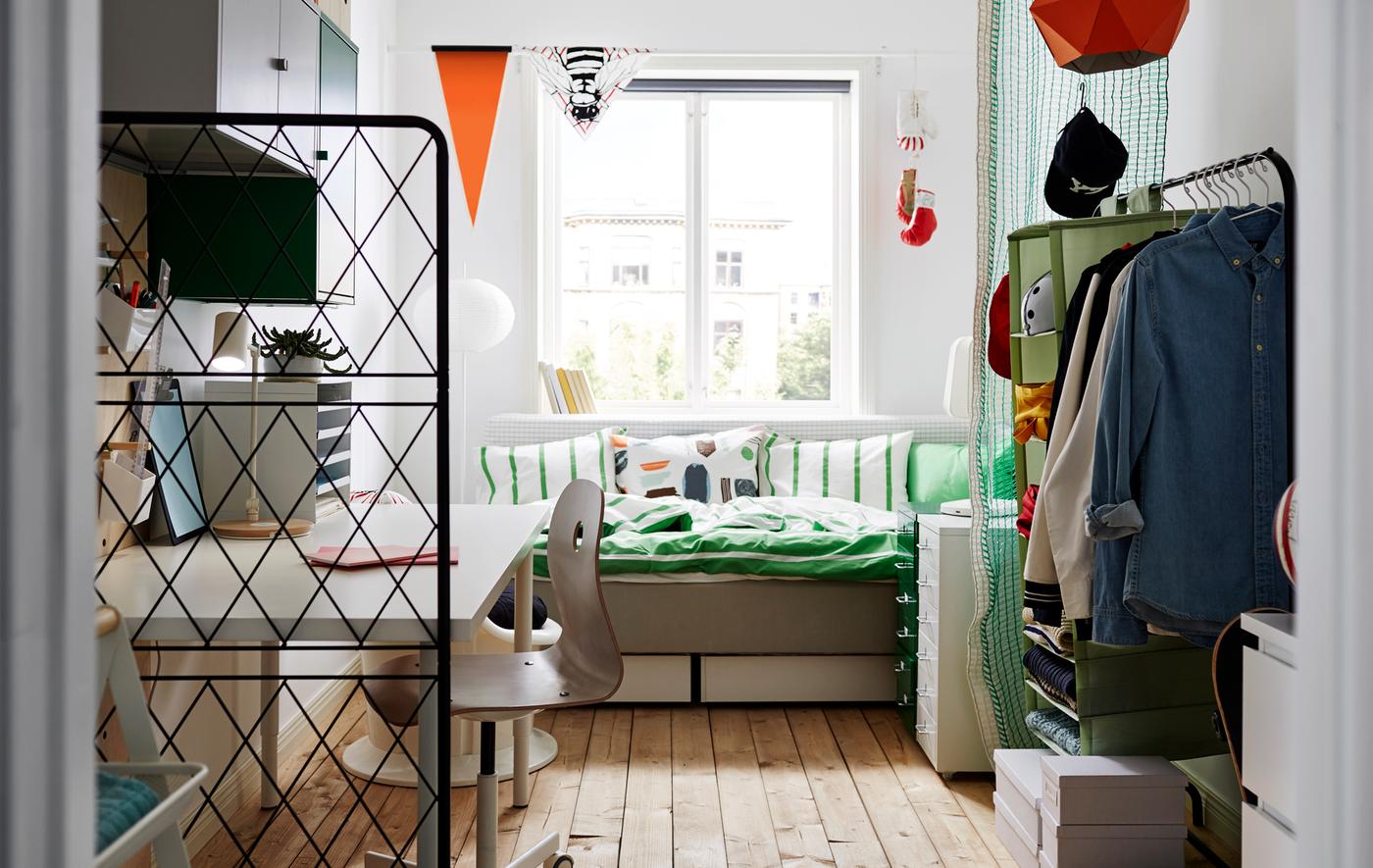 A shot of an entire dorm room from the entrance.