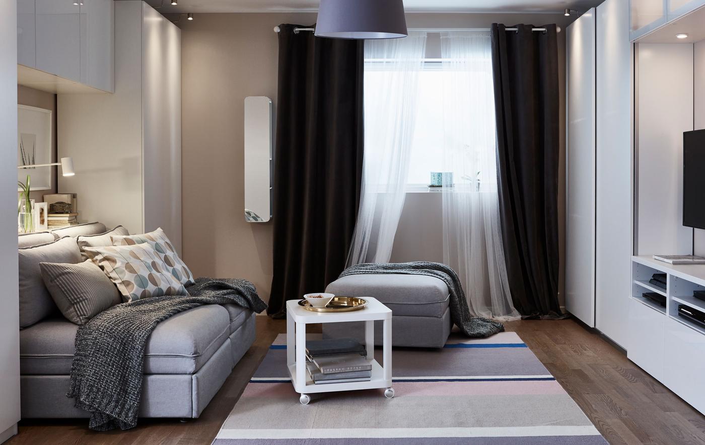A small living room is set up in its living room function.