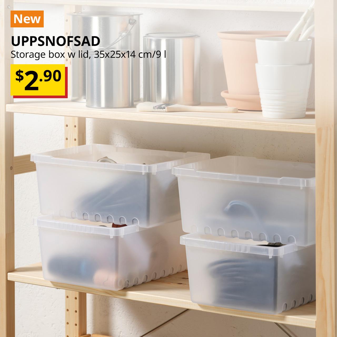 A transparent white UPPSNOFSAD storage box is being stacked on an IVAR pine shelving unit. An orange "NEW" label is displayed in the top left corner of the image, featuring black text that reads: "UPPSNOFSAD, Storage box, 35x25x14 cm/9 l"; with the BTI price in yellow/red and black text: $2.90.