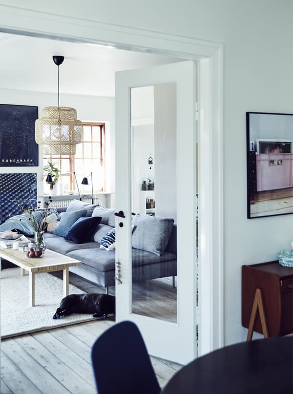 A white, bright living and dining space.