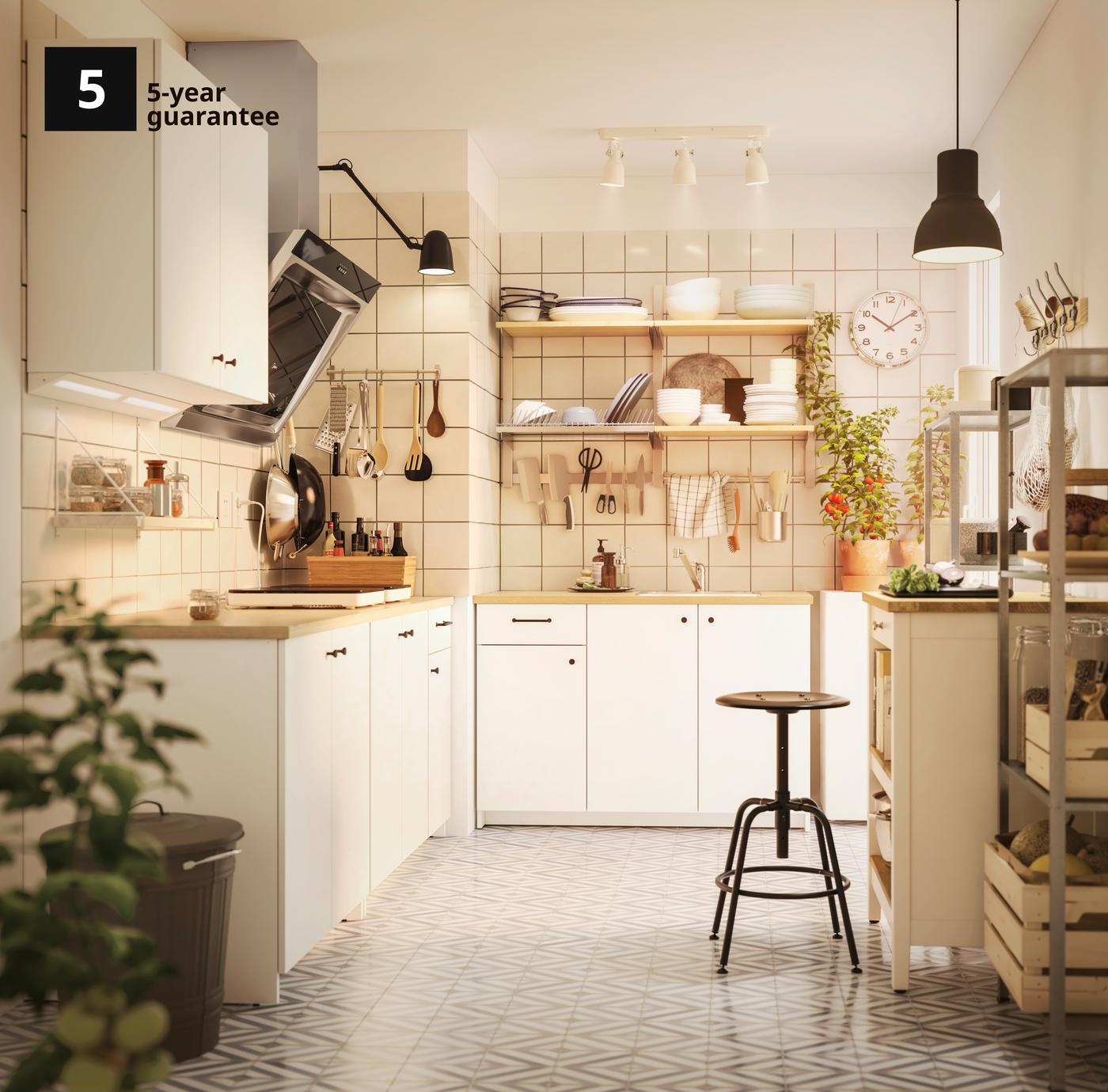 A white KNOXHULT base cabinet with doors in the kitchen. 5-year guarantee on KNOXHULT kitchen