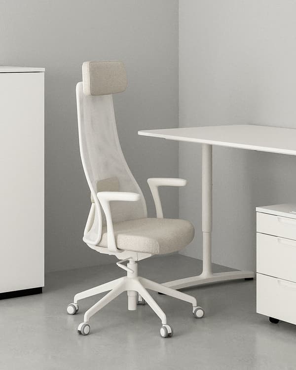 A white office chair and desk 