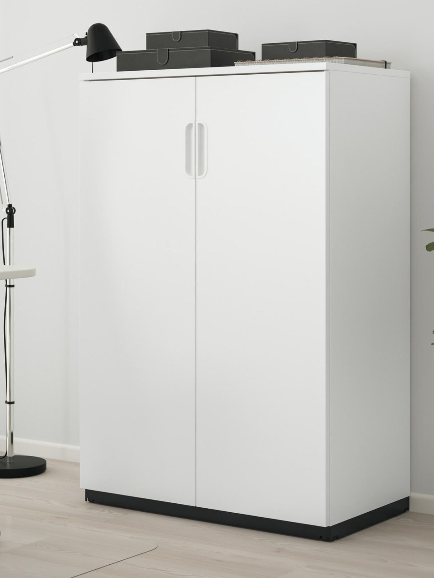 A white storage unit for an office