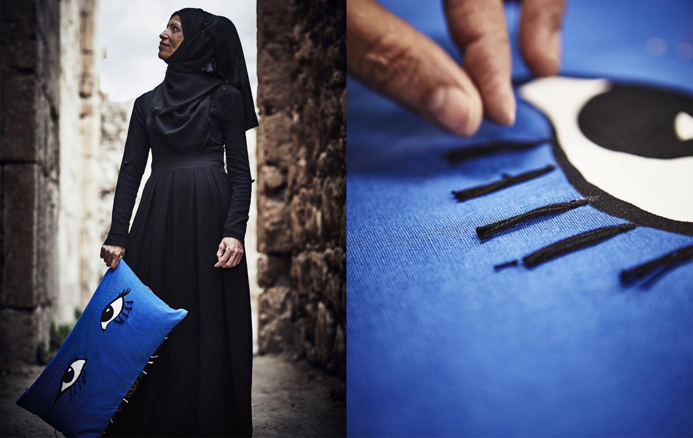 A woman holding a blue cushion with eye design, and a close-up of the eye design with tassels.