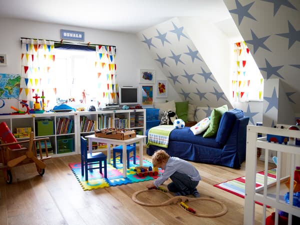 Add some full-size furniture to create a space kids and grown-ups can share.