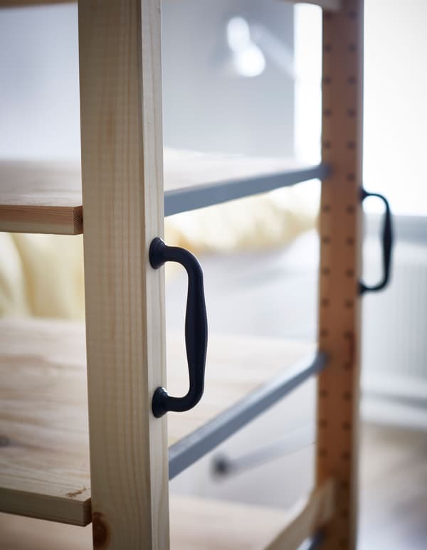 Adding handles to your IVAR shelf makes a decorative touch.
