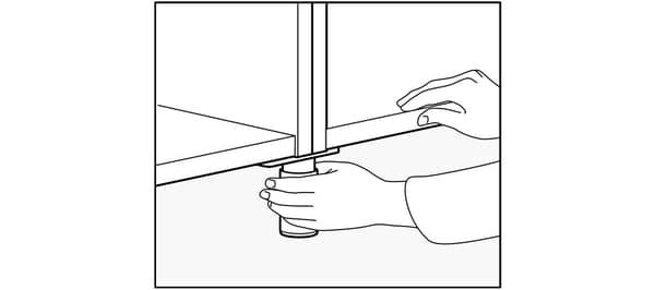 Adjusting IKEA kitchen legs.