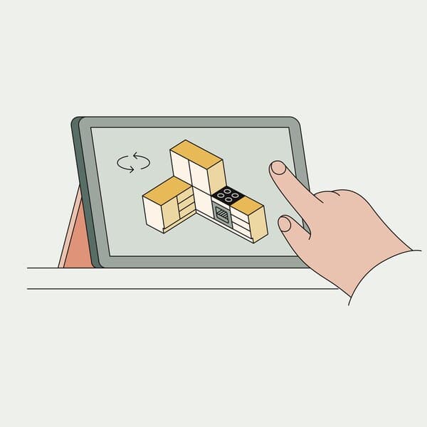 An illustrated image of a hand using the kitchen planner on a tablet.