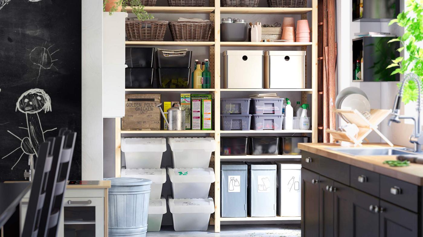 An organized IVAR shelf by the kitchen.