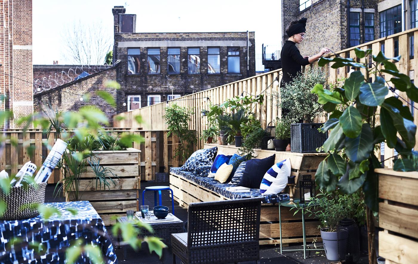 An outdoor terrace with textiles.