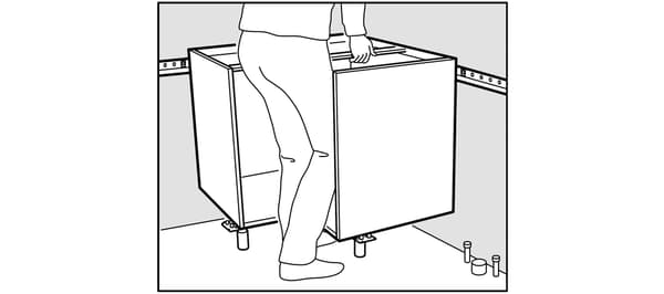 Assembly of IKEA kitchen corner unit.