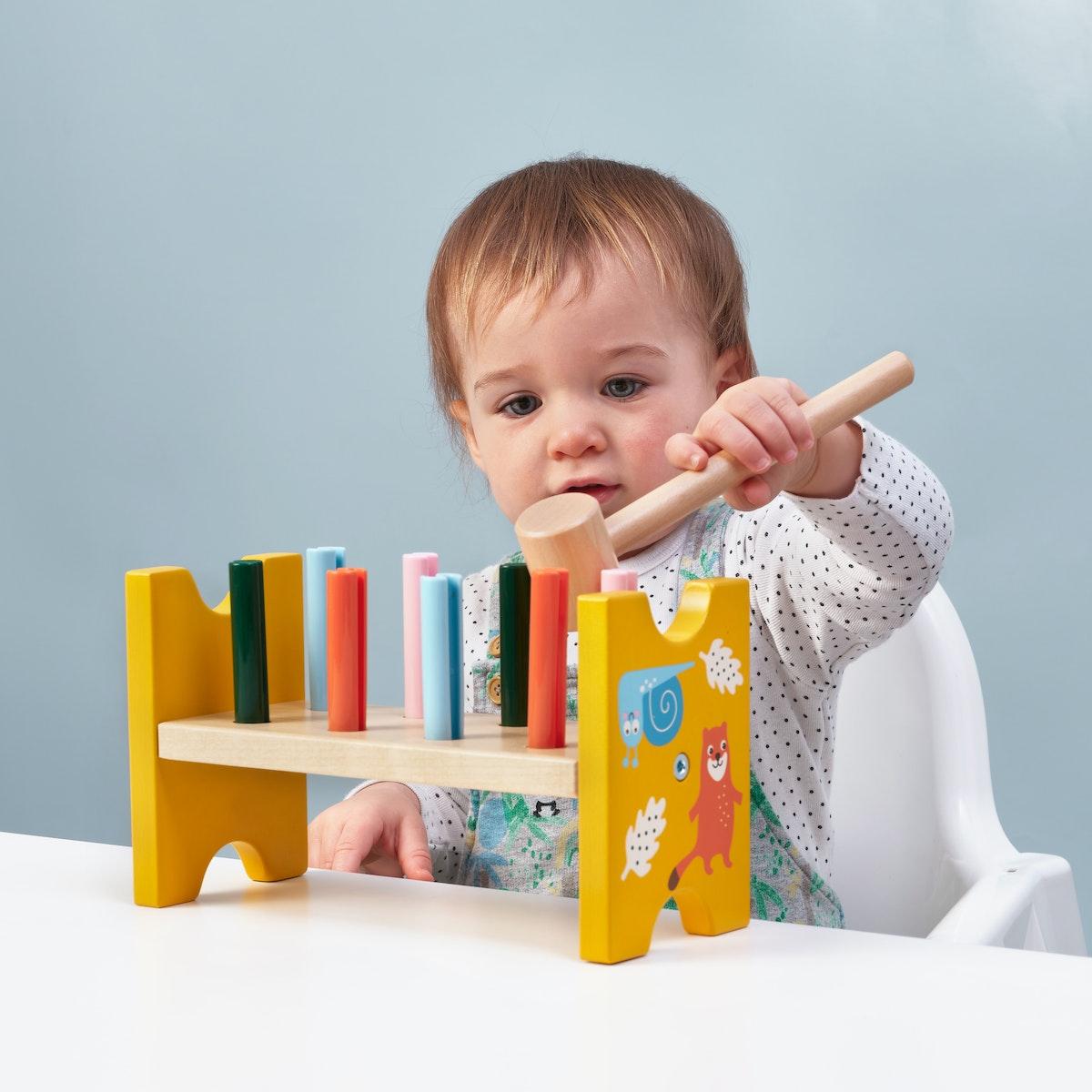 Baby play with UPPSTÅ toy hammering block, multicolour