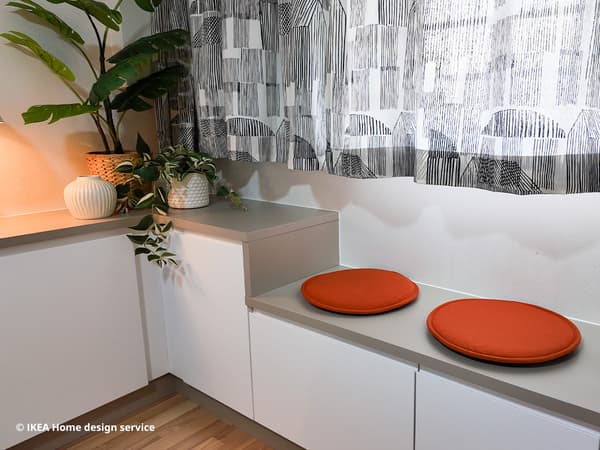 Bay seating area featuring brown and white METOD modular storage in a living room in Singapore, designed by IKEA Home design service