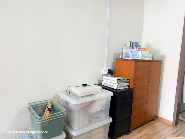 Before photo of a side wall in client's home in Bishan: random cabinet, boxes and organisers are stacked against the wall for storage