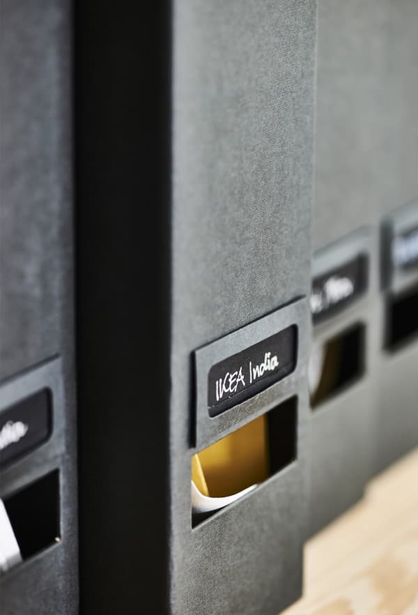 Black box files with name labels.