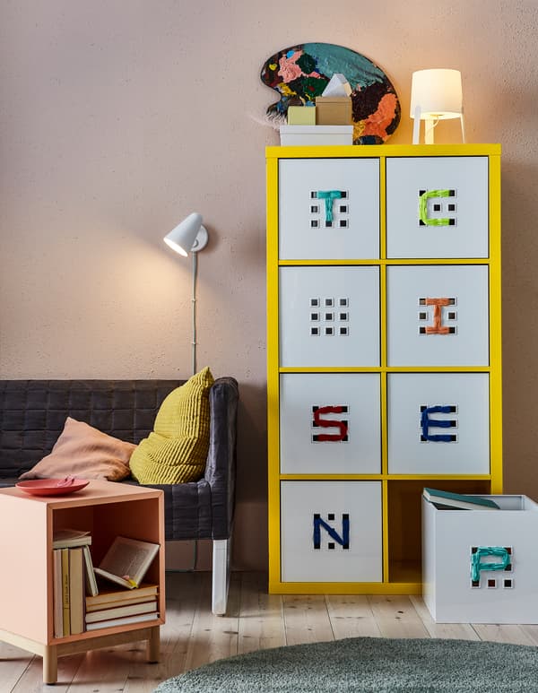 Book storage boxes like white plastic LEKMAN box from IKEA.