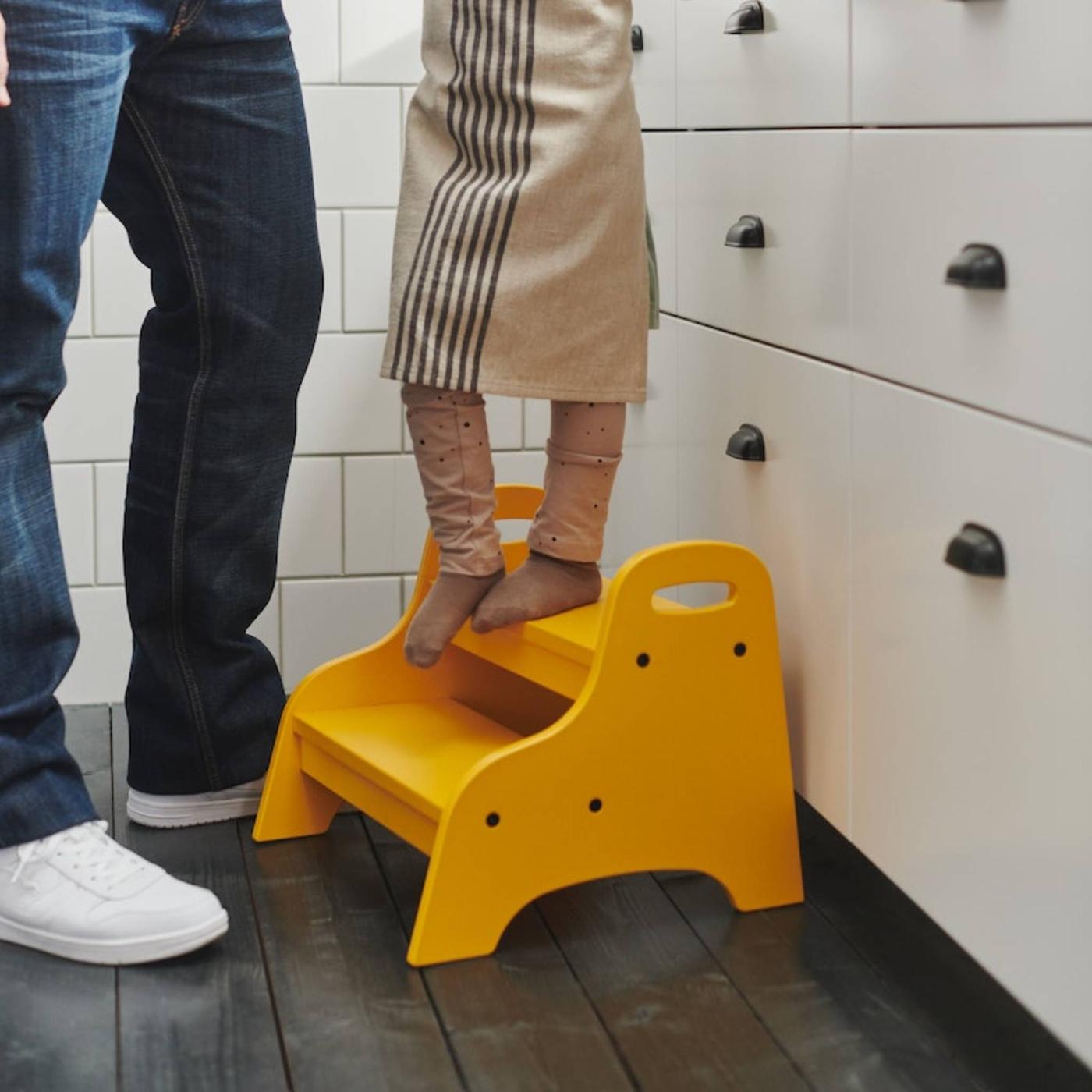 Boy step on TROGEN step stool