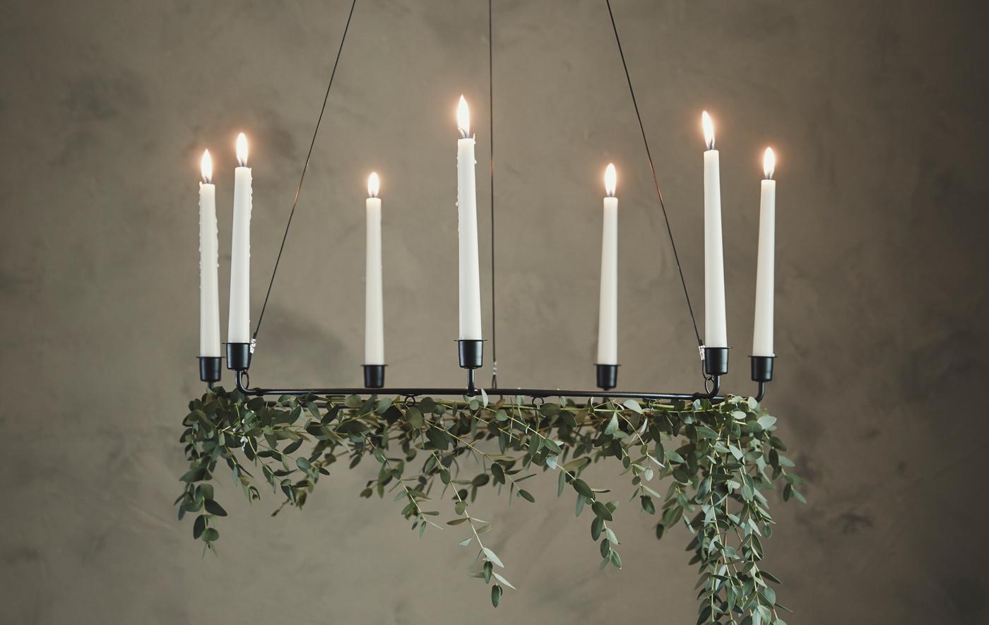 Bring nature into your bedroom this holiday. Decorate your bed frame with plants. IKEA has a lot of modern bed frames such as GJÖRA in birch. Use the low end as a headboard or the other way around. Hang flowers or fabric for a personal touch.