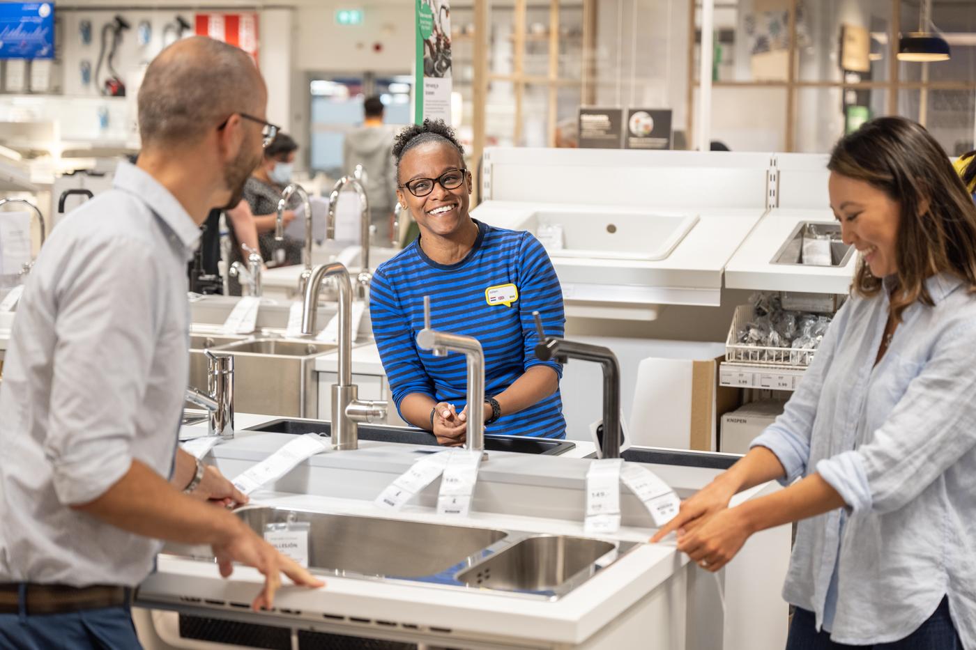 Business co-workers helping out IKEA for Business customers