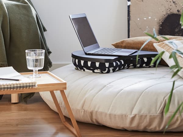 BYLLAN black and white laptop table.