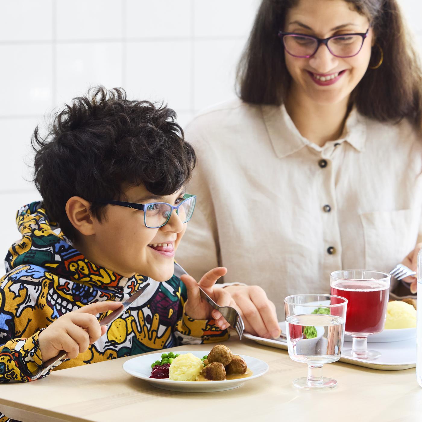child eating Swedish meatballs
