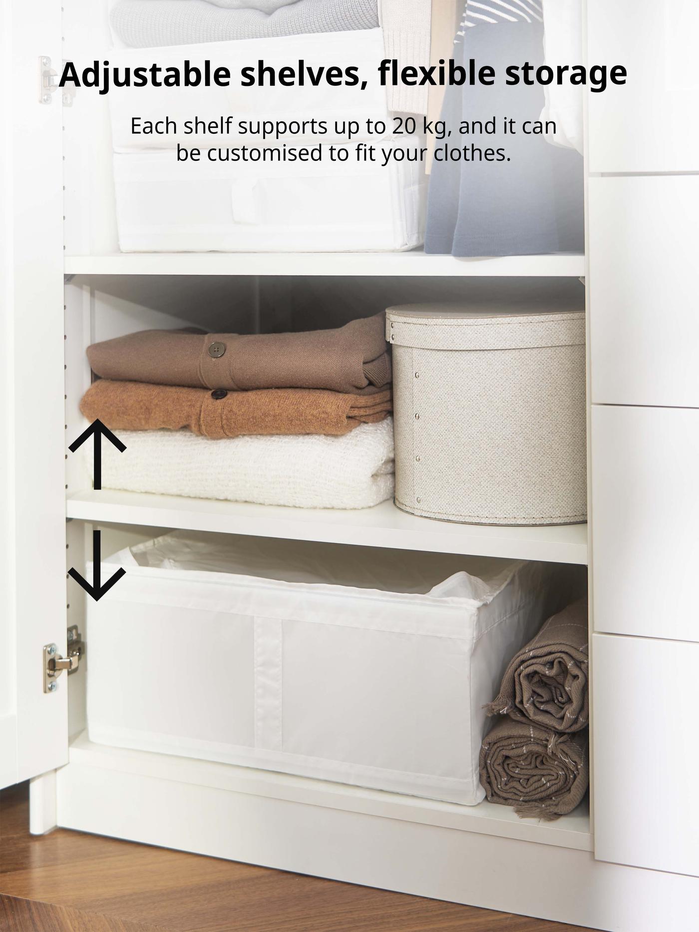 Close-up of MUSKEN's wardrobe adjustable shelves stacked with clothing. Each shelf can hold up to 20kg 