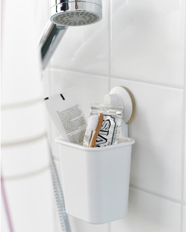 Closeup of a toothbrush suction cup holder.