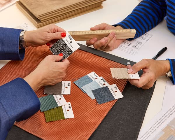 Colours and fabrics being tested and felt by customers.