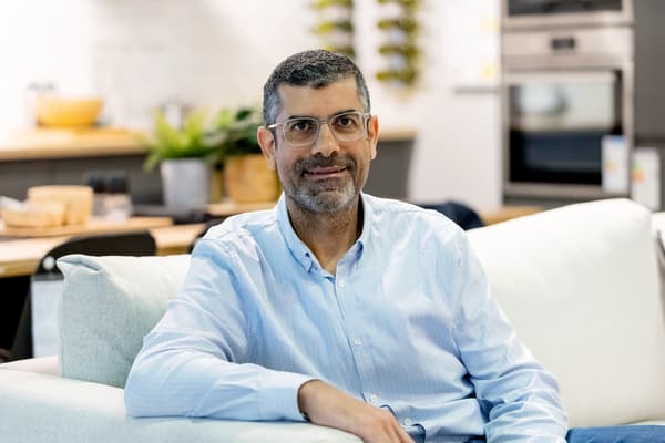 Constantinos Mourouzides in blue shirt