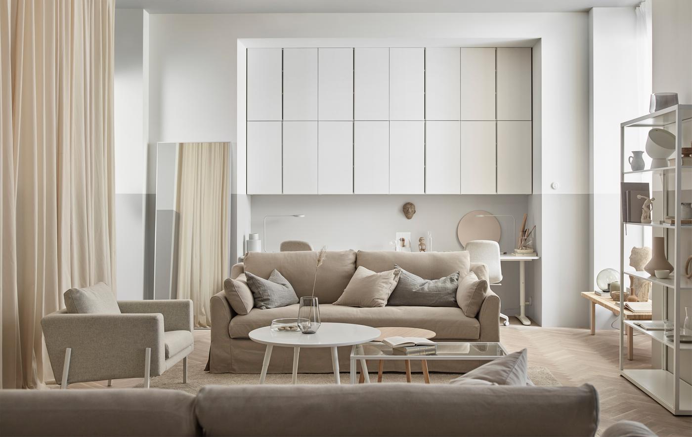 Create a harmonious tone-on-tone living room! Paint a couple of IVAR cabinets in the same hue and hang on the wall for a balanced look.