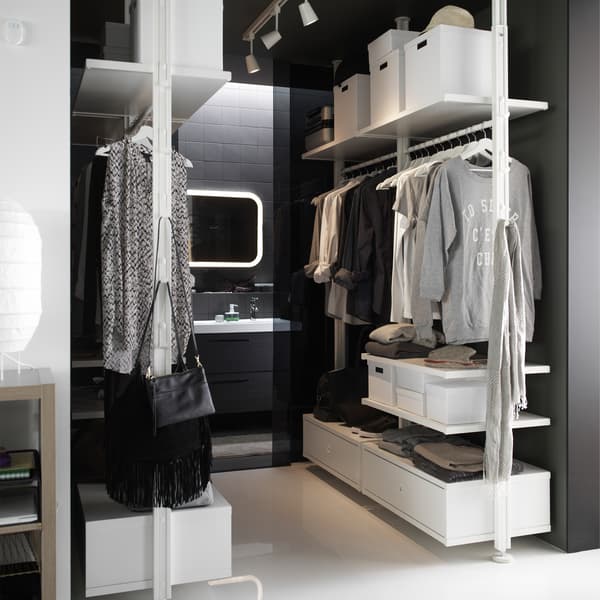 Create a walk in closet with an adaptable storage system! TRY IKEA ELVARLI 2 sections in white and add to them as you please!