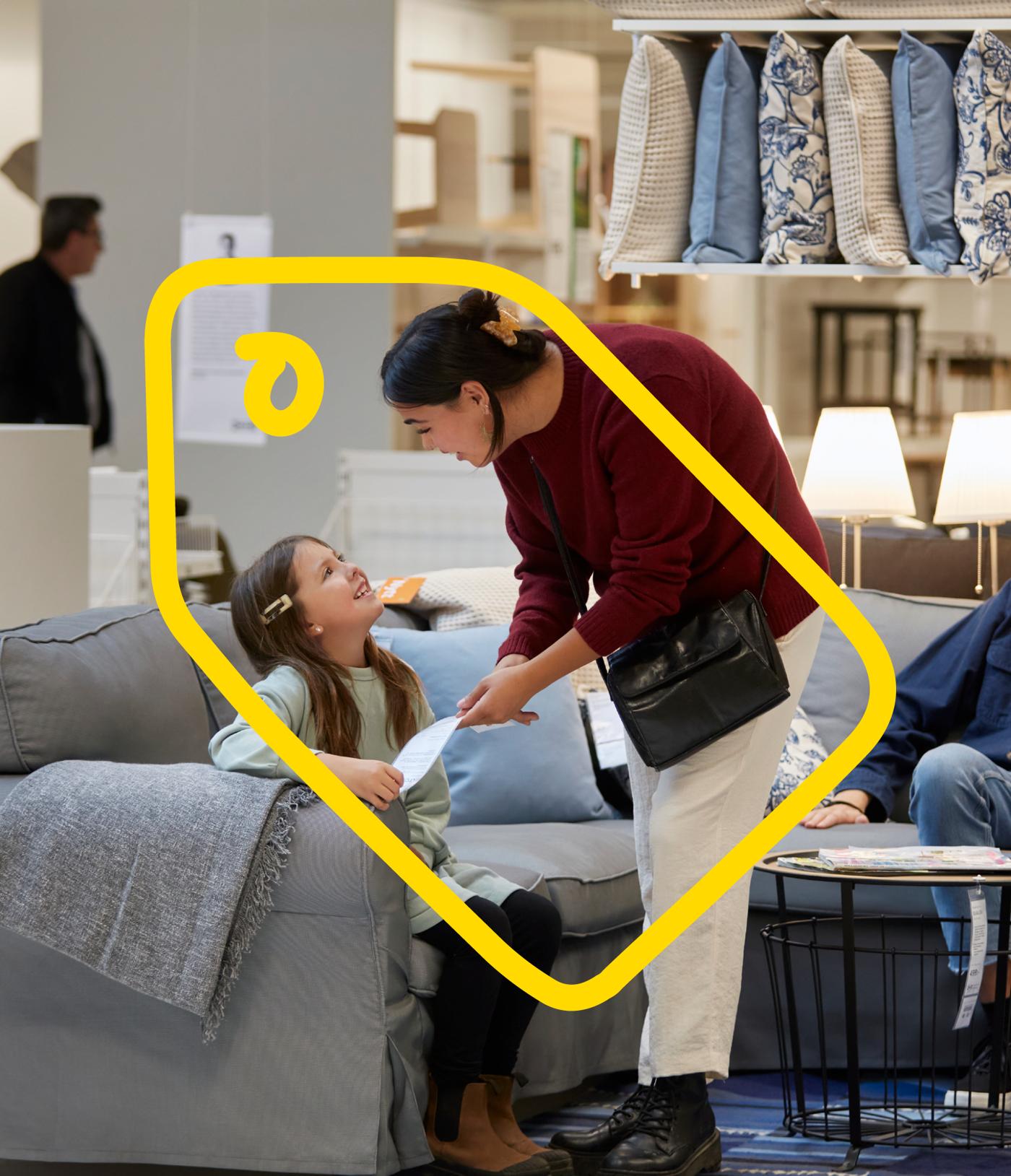 Customer shopping with their child in living rooms