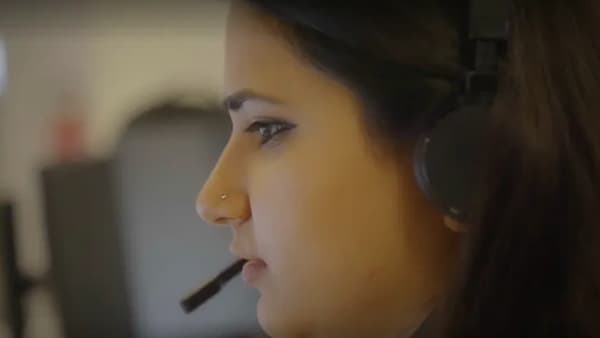 CW attending to customer on phone