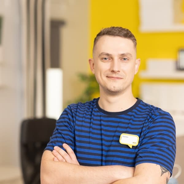 Darius Rimkus - Head of interior design department wearing blue IKEA uniform