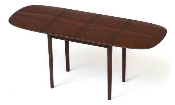 Dark brown RIGA dining table introduced to IKEA range at 1948