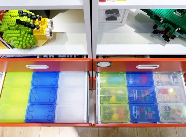 Drawers open featuring colorful storage containers.