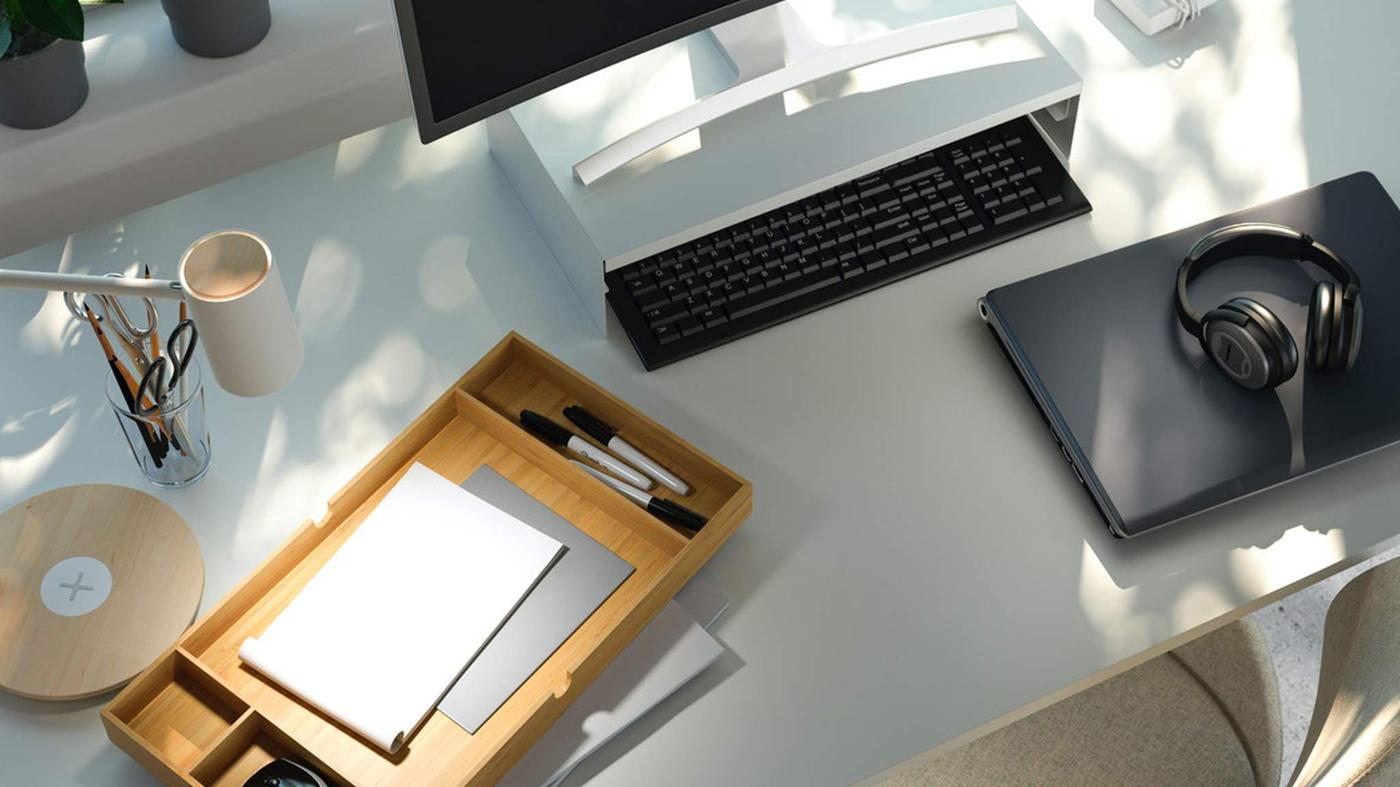 ELLOVEN monitor stand and drawer in a desk setting.