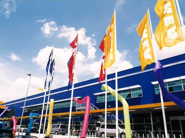 Flags of IKEA in front of the store