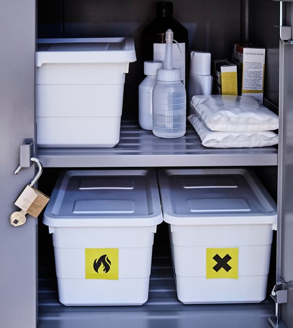 Flammable and toxic laundry items are stored in a lockable cabinet.