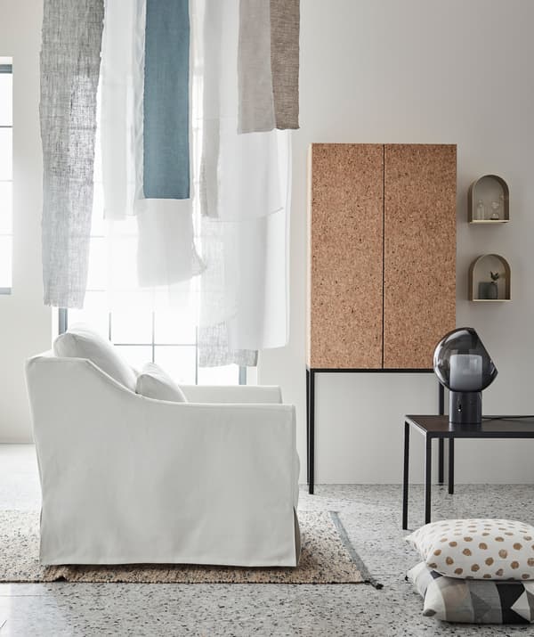 Flowing fabric. soft colours and thin-lined furniture assist daylight and space in giving the room a calm, airy feel.