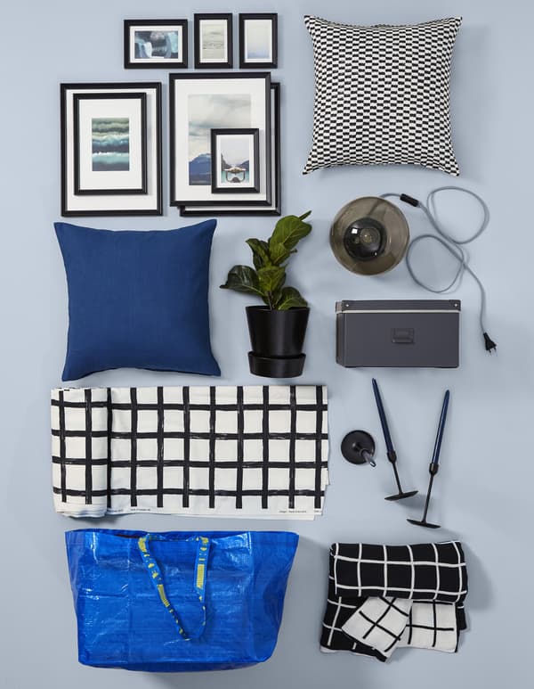 For black and white living room decor, IKEA has options like 100% cotton DVÄRGBJÖRK meter fabric in white and black. Its Scandinavian modern pattern has contemporary checks and mixes well with cushion covers, throws, table lamps, candlesticks and more. 