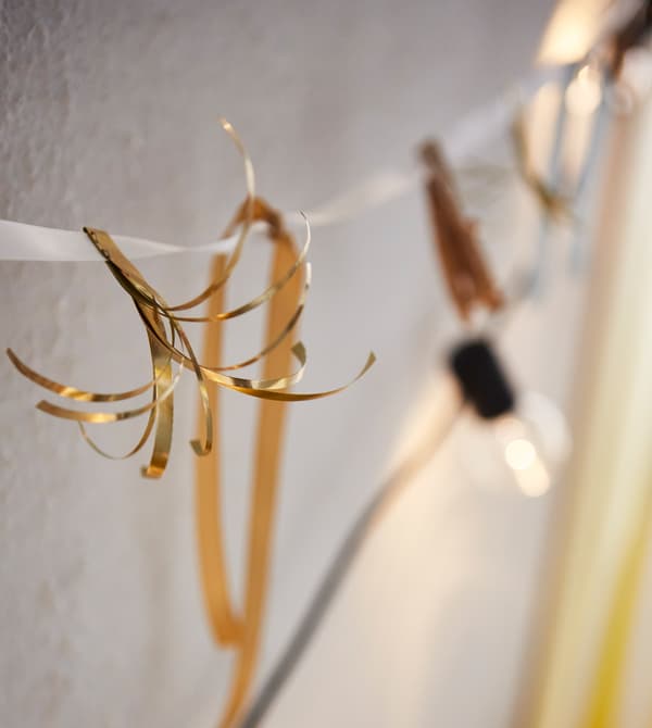 For impressive impact, make bunting by tying paper to a string