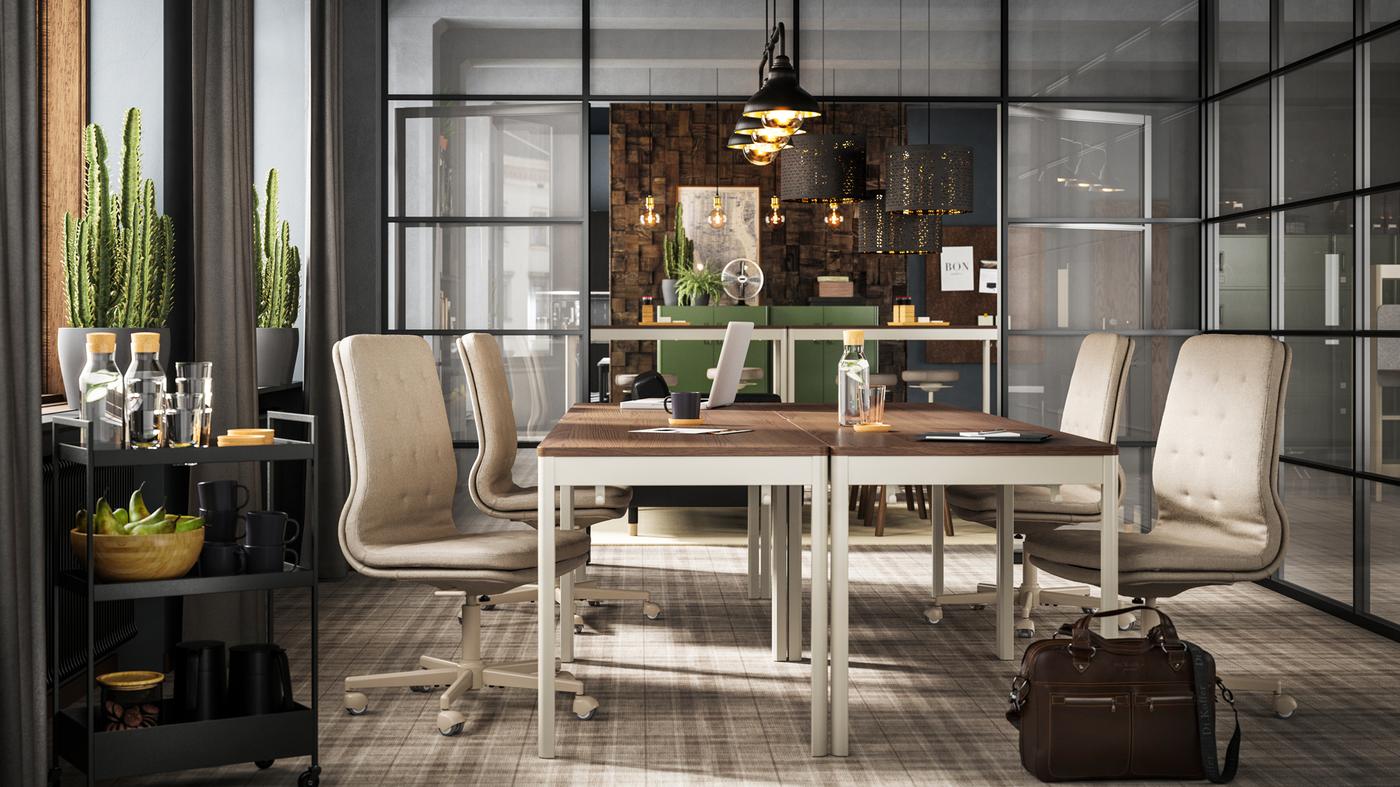 Four brown/beige IDÅSEN tables with beige chairs shown in a conference room with glass walls.
