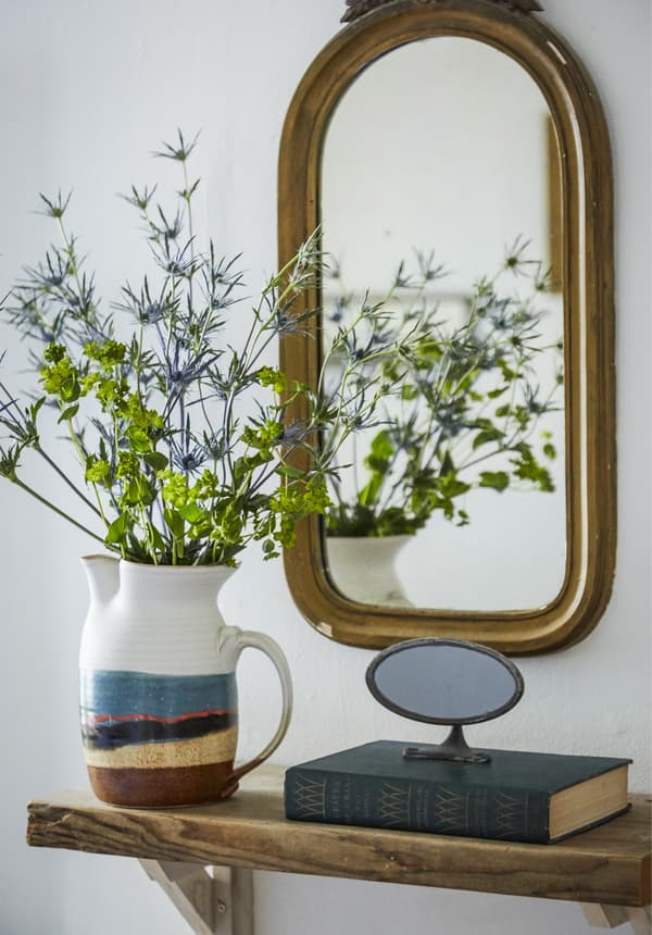 Fresh flowers displayed in a jug 